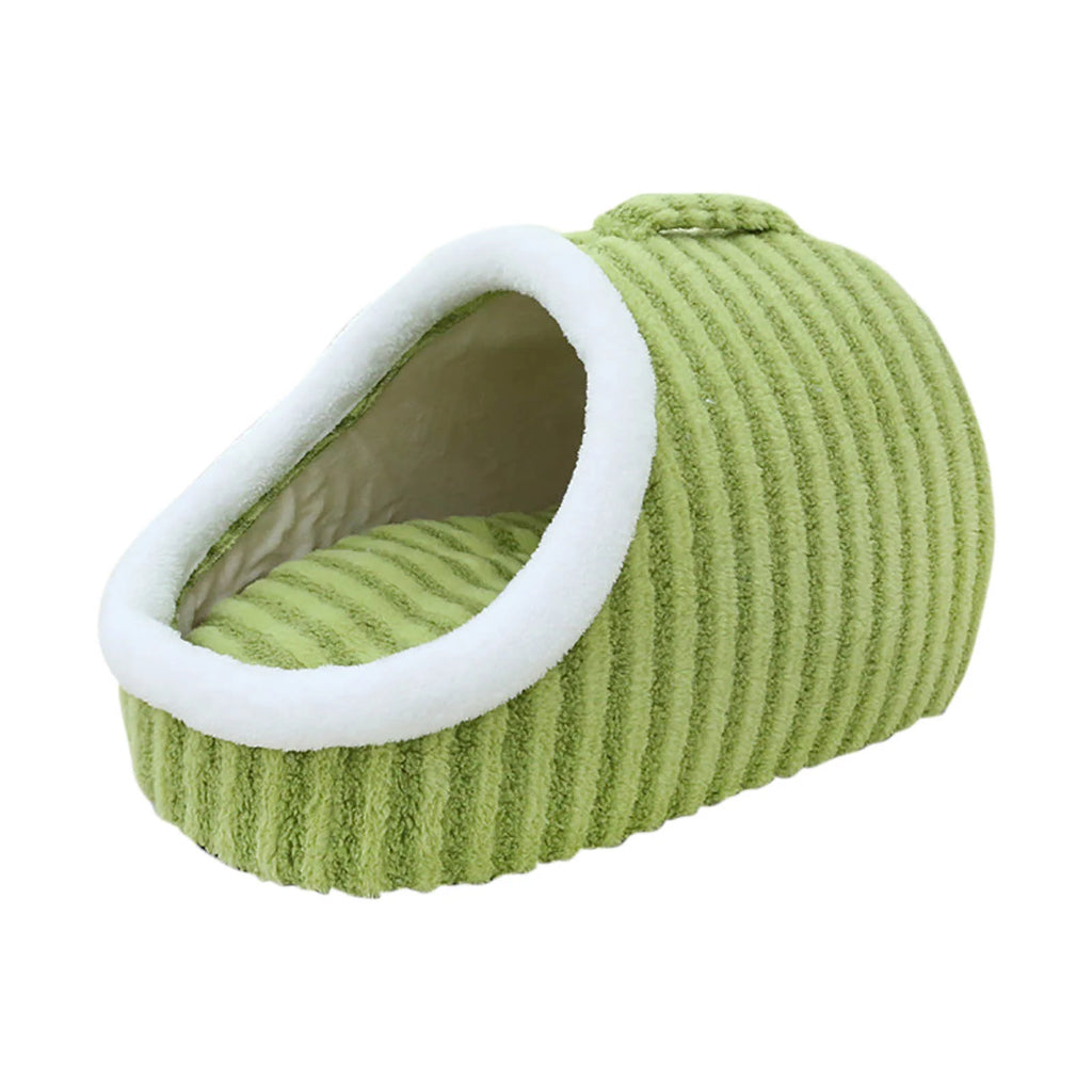 A small ribbed green pet house or cozy with a white faux-fur trim, shown on a plain white background.