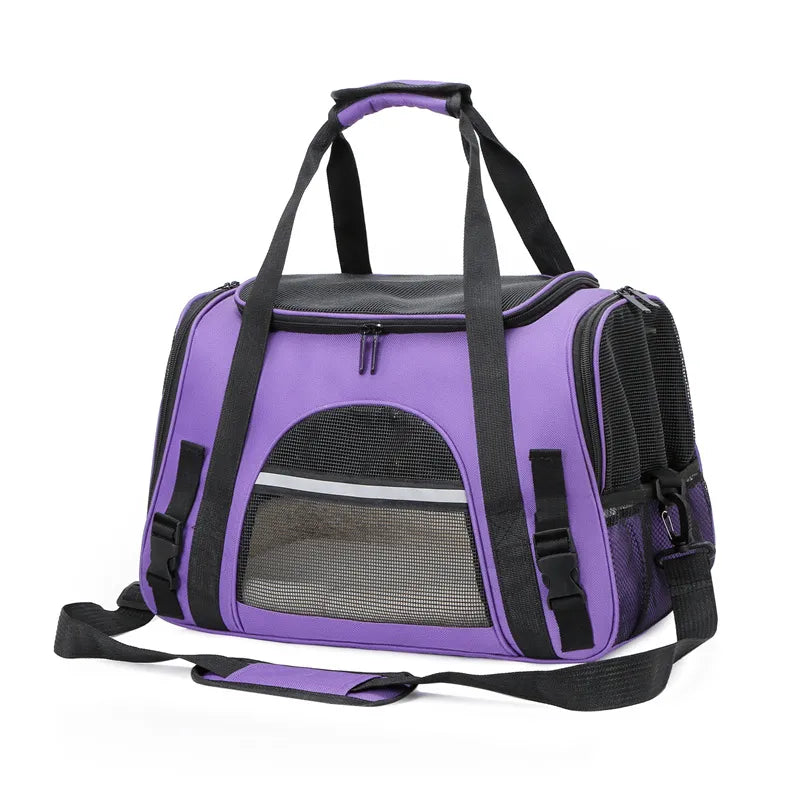 Purple pet carrier with black straps on a white background