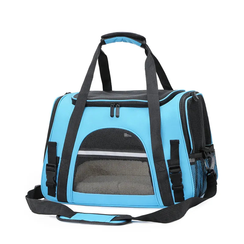 Blue pet carrier with black straps on a white background