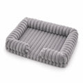 Light grey ribbed corduroy rectangular pet bed with raised bolster sides, shown at a 3/4 angle on a white background