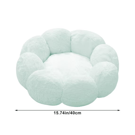A fluffy cloud-shaped pet bed in pale mint green, shown on a white background with a dimension line indicating a width of 15.74 inches (40 cm).