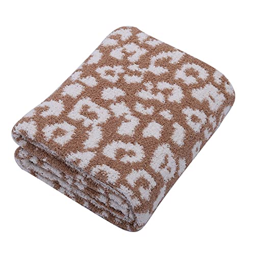 Folded blanket with a brown and white pattern on a white background