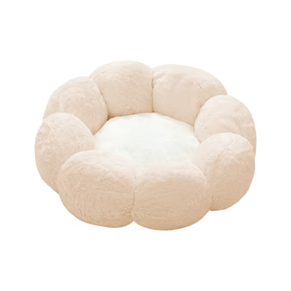 A plush, cloud-like pet bed with a segmented, flower-petal border and a soft white center, shown on a solid white background.