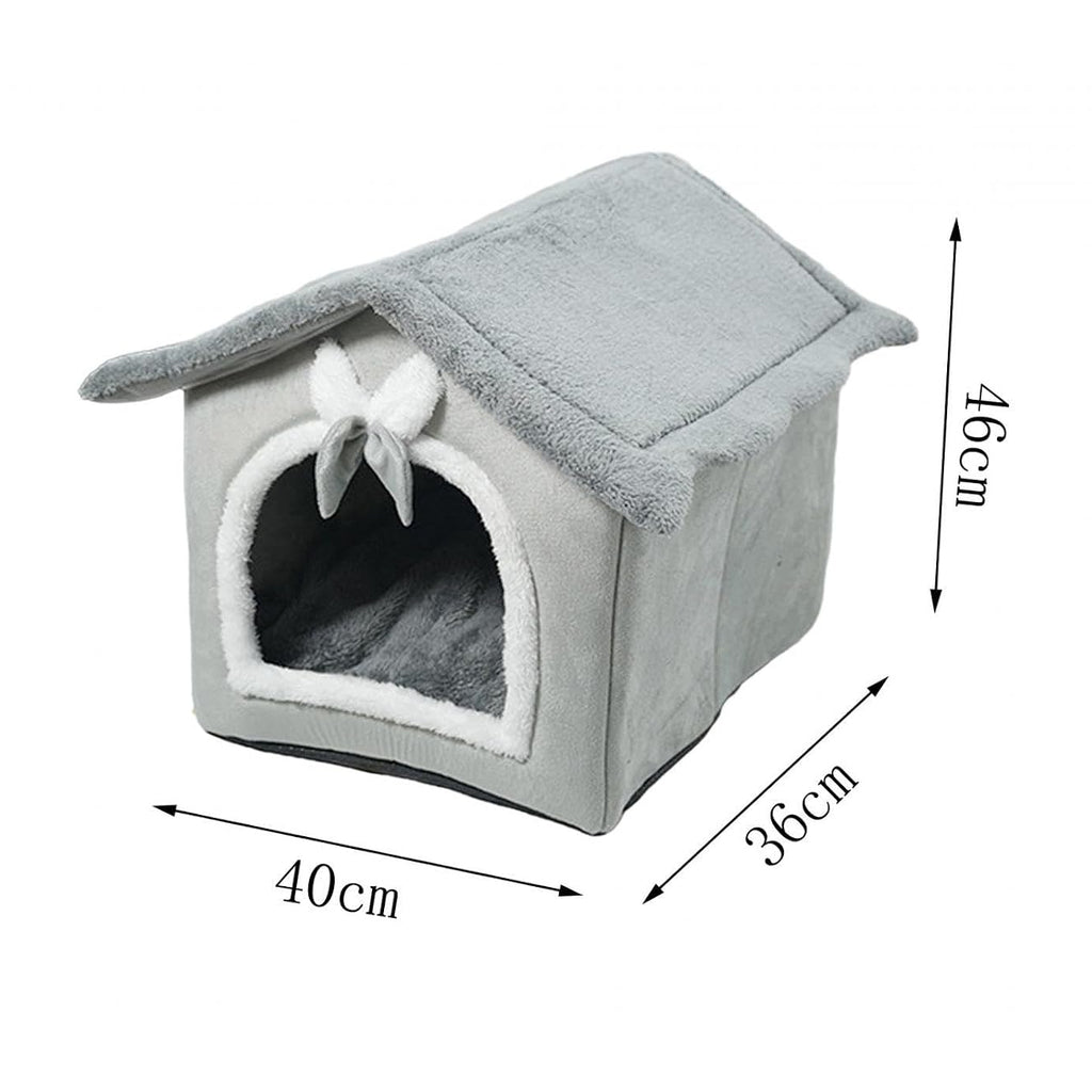 A gray plush pet house with a small white bow on the front, shown with dimension arrows and labels indicating 46cm height, 40cm width, and 36cm depth on a white background.