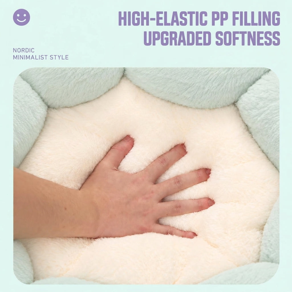 A plush pet bed with a cream-colored high-elastic filling and a mint green plush border, shown with a hand pressing into the soft center. Text on the image reads 'HIGH-ELASTIC PP FILLING UPGRADED SOFTNESS' and 'NORDIC MINIMALIST STYLE'.