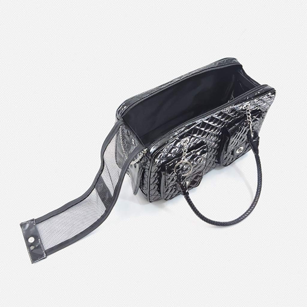 A black textured faux-croc pet carrier with a mesh side pocket and a black strap, shown open against a light gray background.