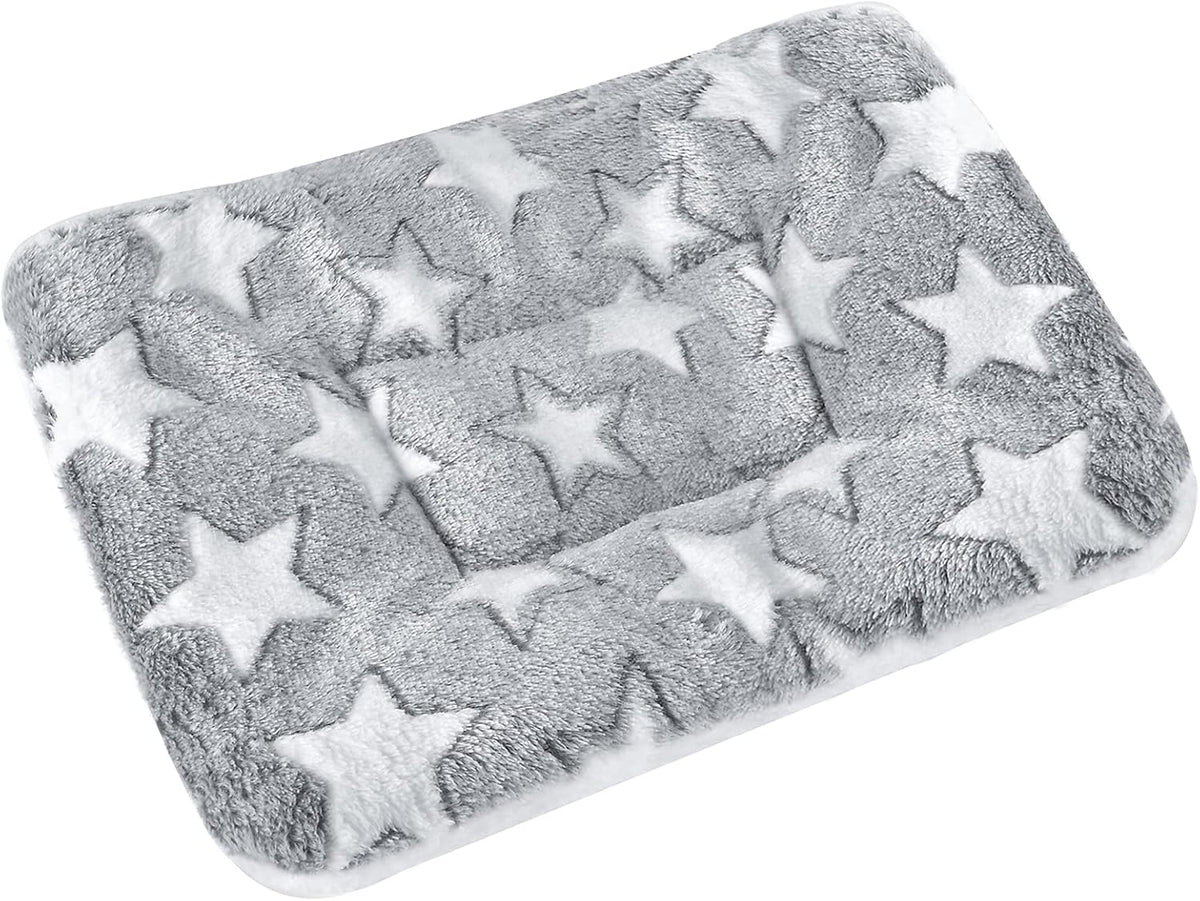 Grey plush star print pet mat top-down view on white background