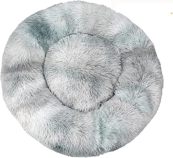 Round grey tie-dye shaggy faux fur donut calming pet bed top-down view on white background
