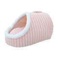 A pink and white striped plush slipper-style pet bed with a white faux-fur trim, shown on a solid white background.
