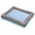 Pet bed with blue cushion and brown border on a white background