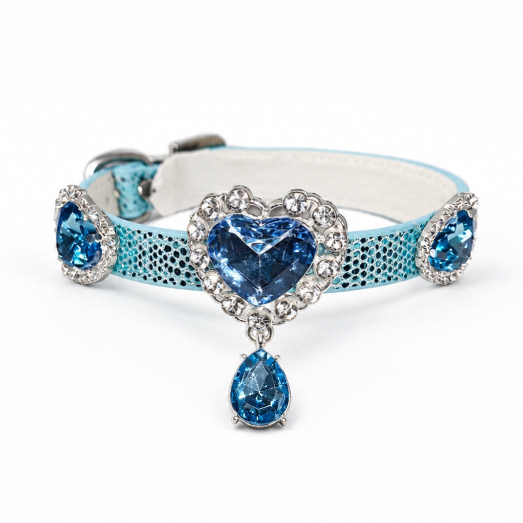 Light blue dog collar with sapphire blue heart crystal centerpiece, flanking teardrop crystals, and dangling blue teardrop drop