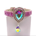 Pink glitter dog collar with large aurora borealis teardrop crystal sunburst centerpiece and dangling AB crystal drop