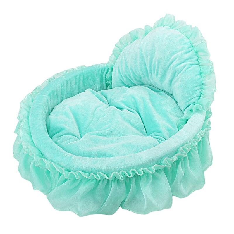 Mint teal velvet heart-shaped ruffle pet bed with matching chiffon ruffle trim and cushioned interior, white background