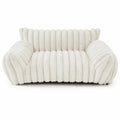 Ivory white rectangular pet sofa bed with thick ribbed channel-tufted plush fabric, rounded raised back and armrests, and a deep cushioned seat, shown from the front on a white background