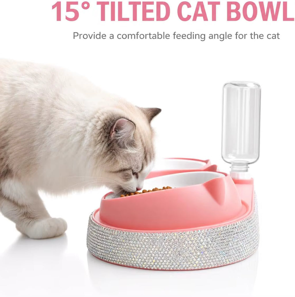 A light-colored cat eating from a pink pet feeder bowl with a clear water bottle attached, on a white background with promotional text at the top.