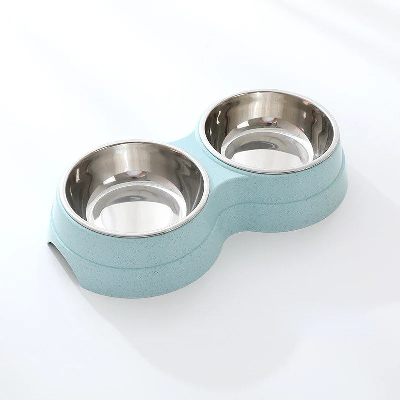 Double stainless steel pet bowl set in a light blue plastic base, white background
