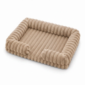 Beige/sand ribbed corduroy rectangular pet sofa bed with raised bolster sides, shown at a 3/4 angle on a white background