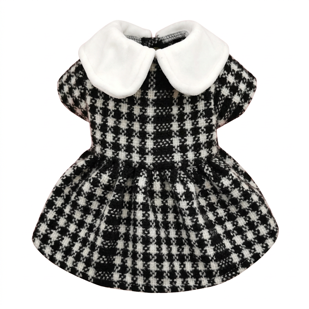 Black-and-white houndstooth pet dress on a square white background