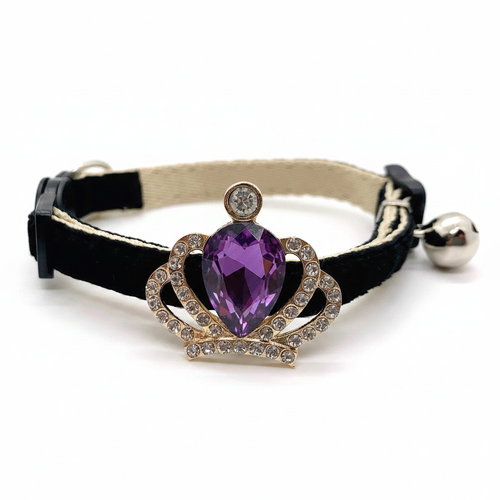 Black velvet cat collar with gold crown pendant, large purple amethyst teardrop gem, rhinestone accents, safety breakaway buckle and silver bell — luxury cat collar