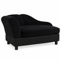 Black pet couch matching the green couch orientation