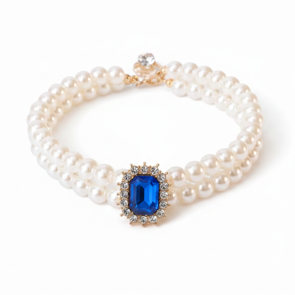 Double-strand pearl pet collar with sapphire blue emerald-cut crystal centerpiece and gold hardware