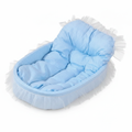 Pastel blue gingham oval pet bed with tufted bolster backrest and sheer white lace ruffle trim, angled product shot on white background