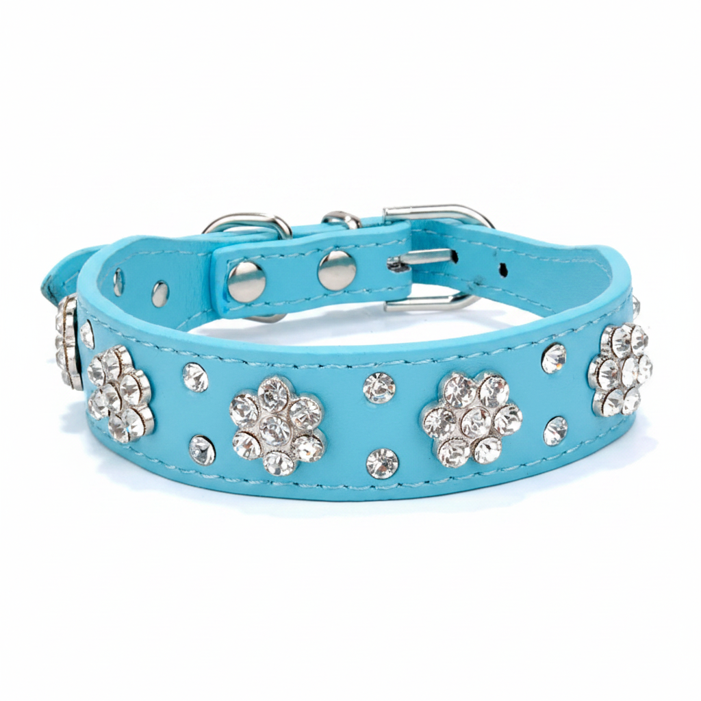 Blue rhinestone flower dog collar with sparkling floral embellishments, shown against a soft lavender studio background.