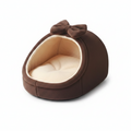 Rich brown plush igloo cat cave bed with matching bow detail and cream fleece interior, white background