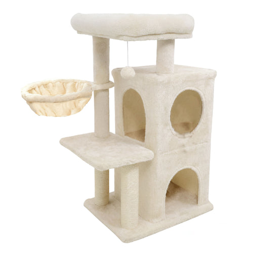 A multi-level cat tree in a warm cream or off-white plush fabric, featuring a top platform, a scratching post with sisal-wrapped columns, a hanging fabric hammock, a middle perch, and a small enclosed hide with circular openings.