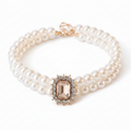 Double-strand pearl pet collar with champagne emerald-cut crystal centerpiece and gold hardware