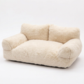 Cream pet couch on a white background, square