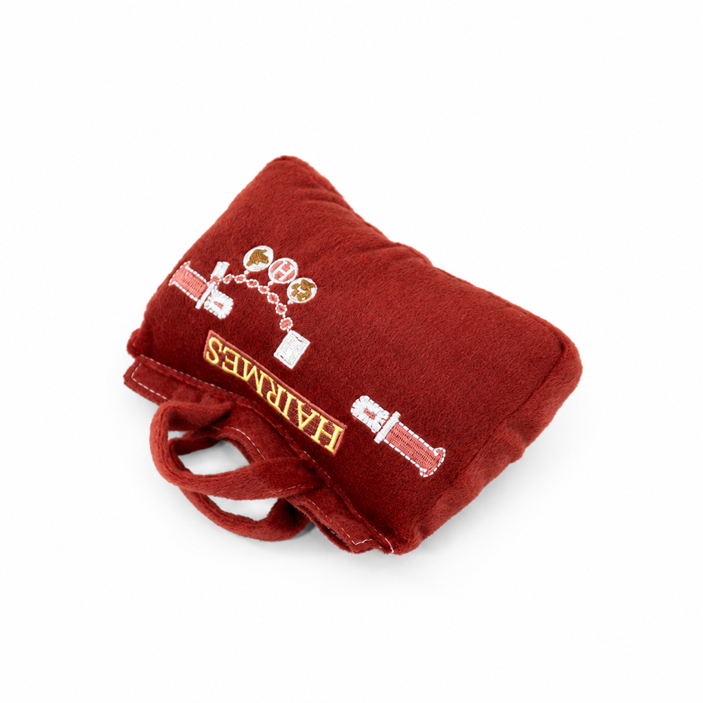 Diagonal handbag plush on white background