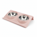 Blush pink double pet bowl feeder with two stainless steel bowls on elevated tray stand for cats and dogs