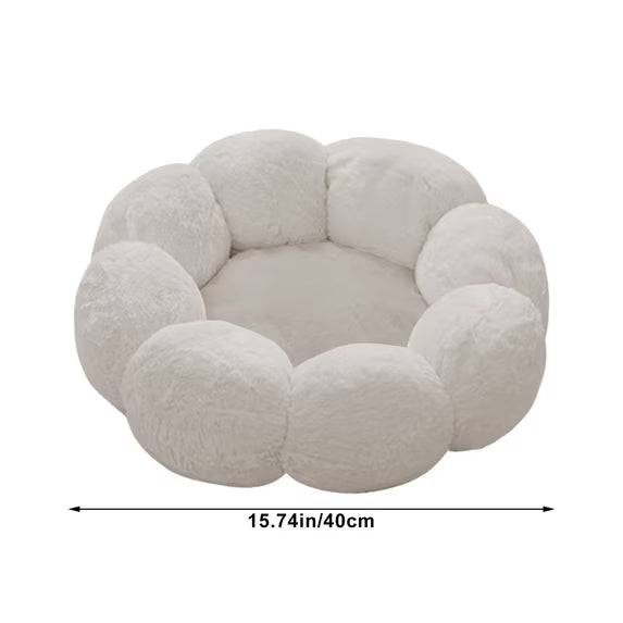 A round, plush pet bed with a scalloped, flower-like border, shown on a white background with a dimension line indicating a width of 15.74 inches (40 cm).