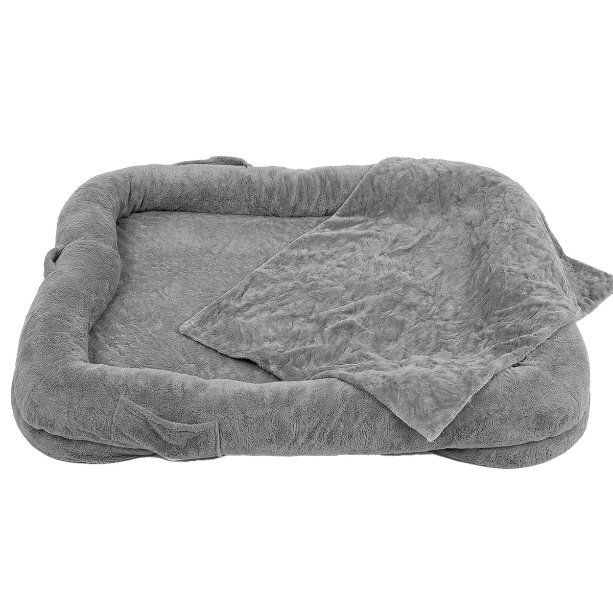 Oversized grey plush human-sized dog bed with bolster sides and matching faux fur blanket on white background