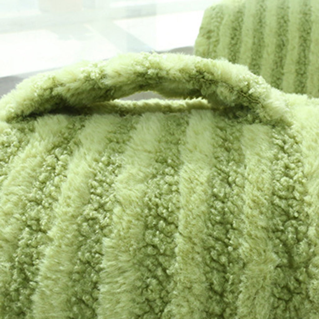 Close-up of a sage green chunky corduroy pet bed showing the low front entry opening and textured ribbed fabric detail.