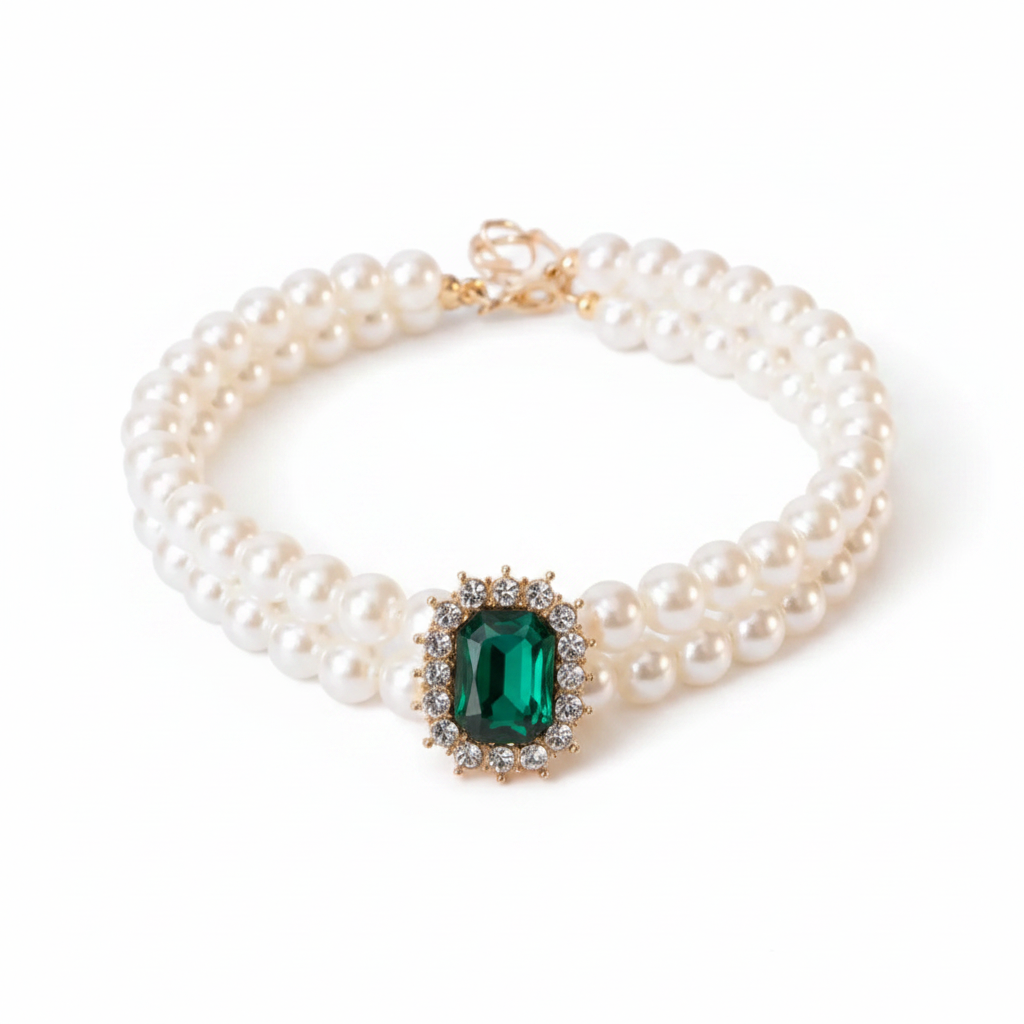 Double-strand pearl pet collar with emerald green emerald-cut crystal centerpiece and gold hardware