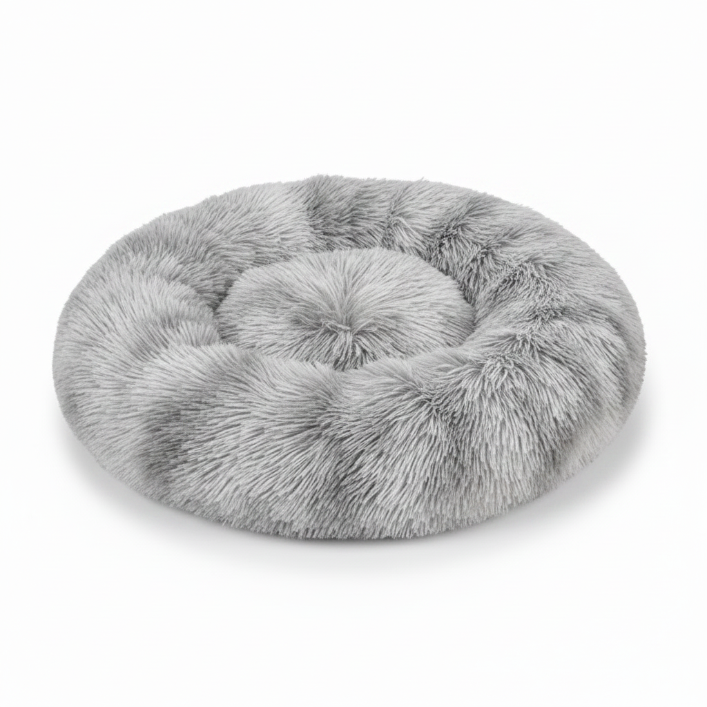 Round grey tie-dye shaggy faux fur donut calming pet bed top-down view on white background