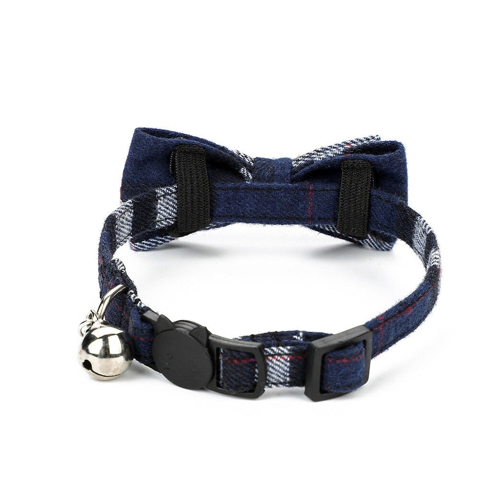 Navy blue tartan plaid cat collar with bow tie, silver bell, and cat-shaped safety breakaway buckle