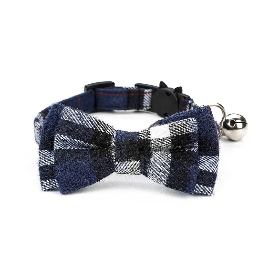 Plaid bow tie cat collar with bell on a white background