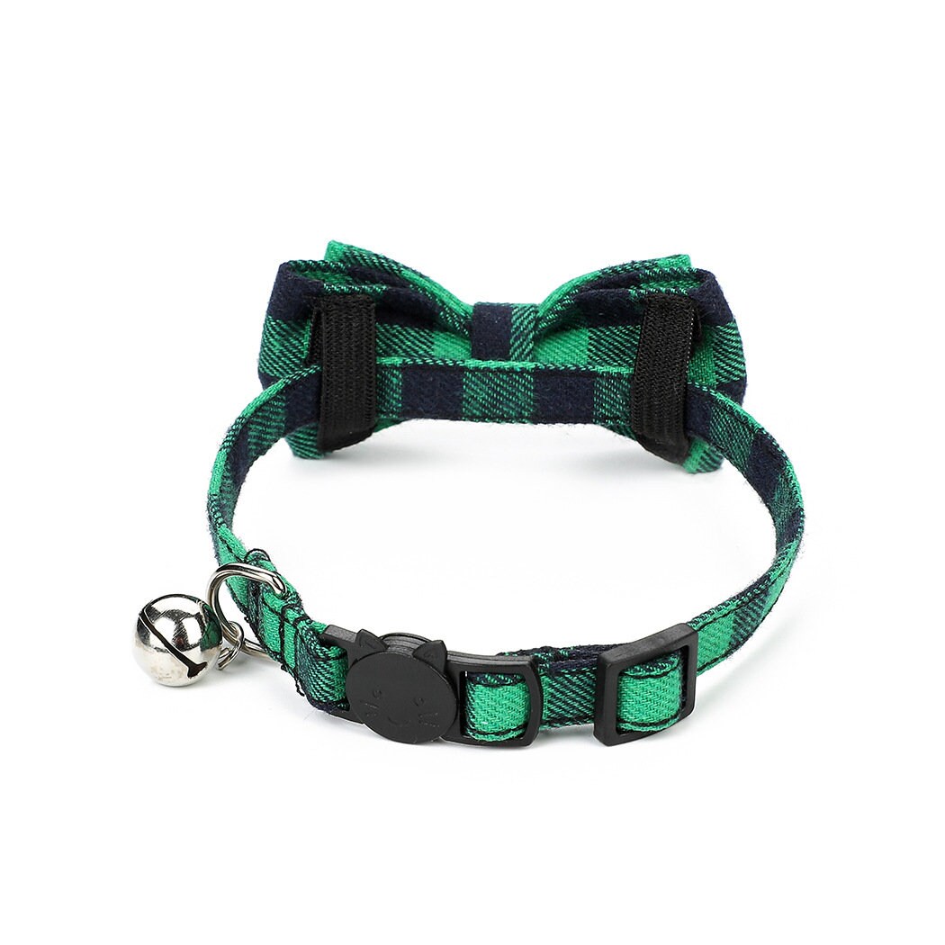 Green and black buffalo plaid cat collar with bow tie, silver bell, and cat-shaped safety breakaway buckle