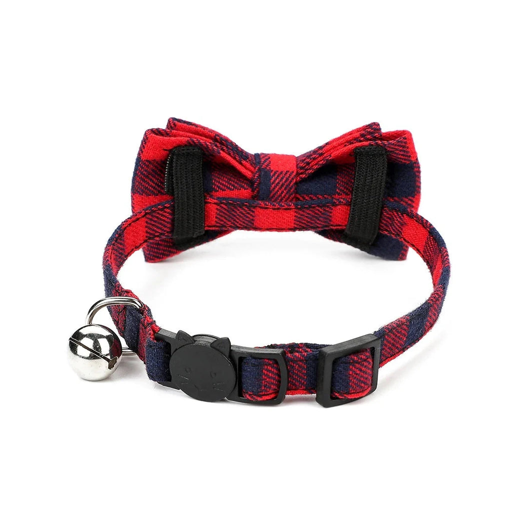 Red and black buffalo plaid cat collar with bow tie, silver bell, and cat-shaped safety breakaway buckle