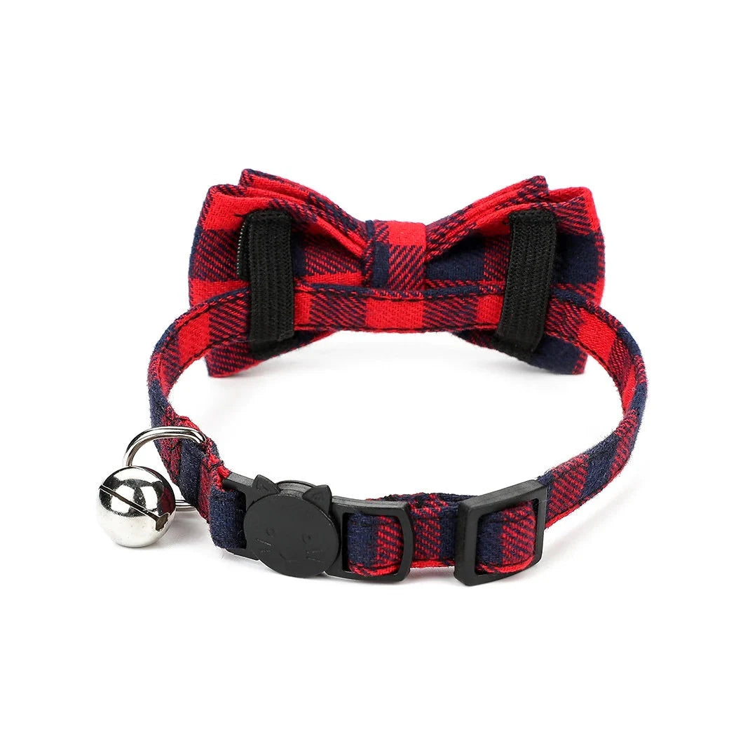 Red and black buffalo plaid cat collar with bow tie, silver bell, and cat-shaped safety breakaway buckle