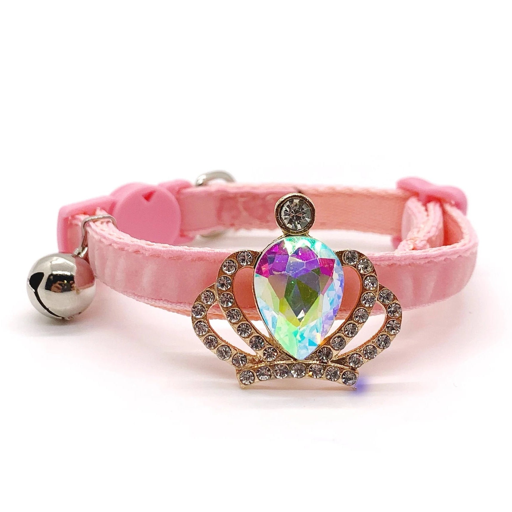 Pink velvet pet collar with gold crown aurora borealis iridescent crystal centerpiece, rhinestone halo setting, and silver bell for cats and dogs