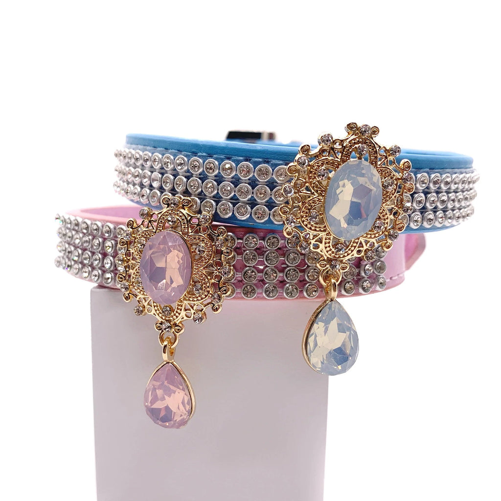 Stacked pink and blue velvet luxury dog collars with triple-row crystal rhinestone bands and gold baroque unicorn cameo filigree charms with opal teardrop pendants