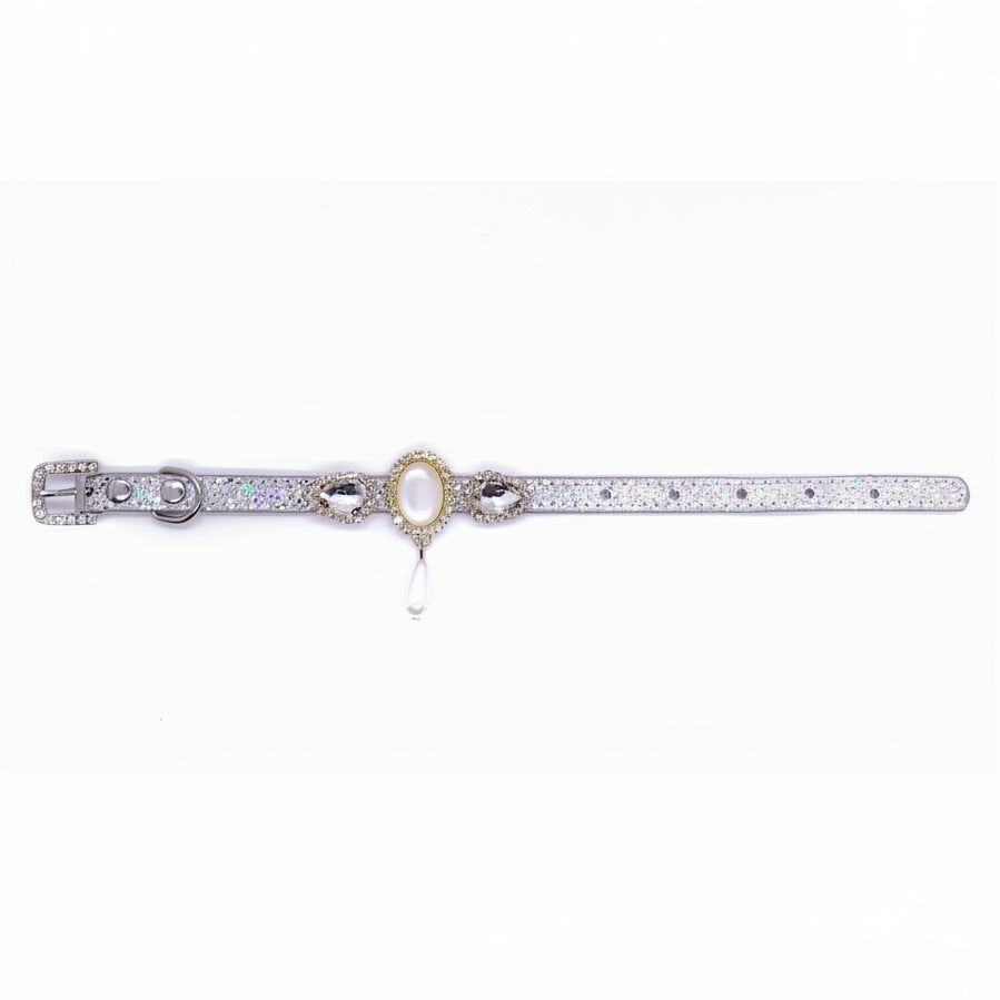 Silver iridescent glitter pet collar with gold oval pearl centerpiece, crystal rhinestone halo setting, side bow accents, and dangling pearl teardrop pendant for cats and dogs