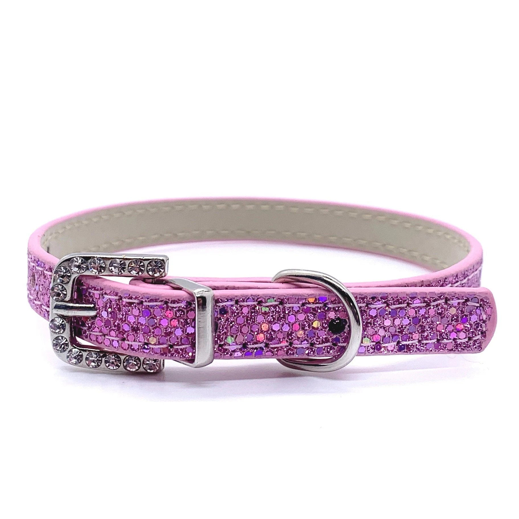 Pink glittery pet collar with a silver buckle for cats and dogs on a white background