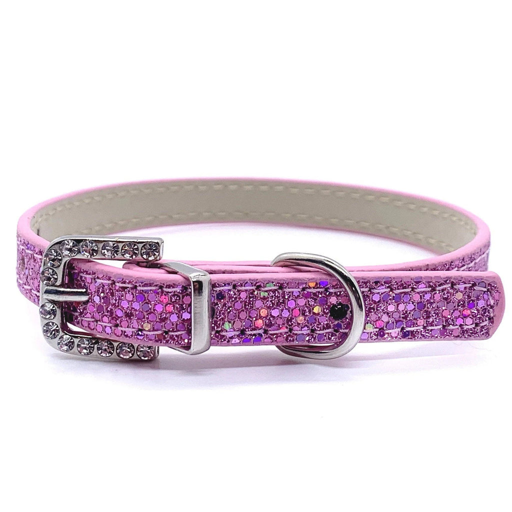 Pink glittery dog collar with a silver buckle on a white background
