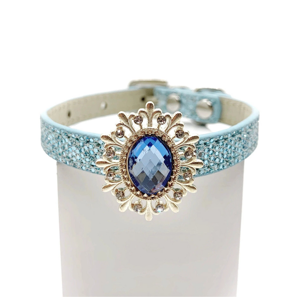 Baby blue glitter pet collar with gold sunflower brooch centerpiece, sapphire blue oval crystal gemstone, and rhinestone petal accents for cats and dogs