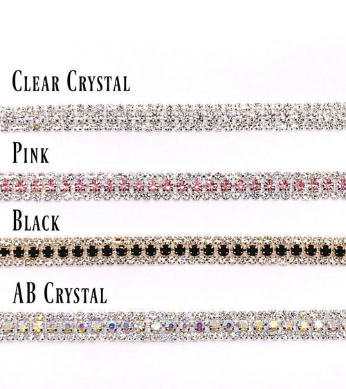 Four types of decorative ribbons with clear crystal, pink, black, and AB crystal patterns on a white background.